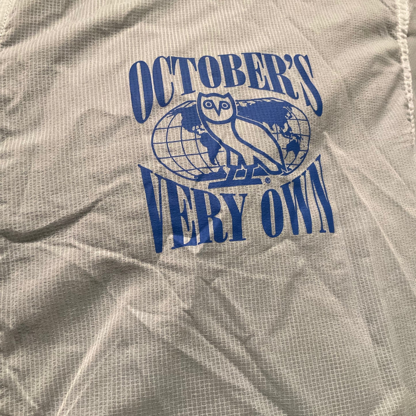 OVO - WHITE/BLACK WORLD TOUR TRANSLUCENT ZIP UP JACKET (XXL)